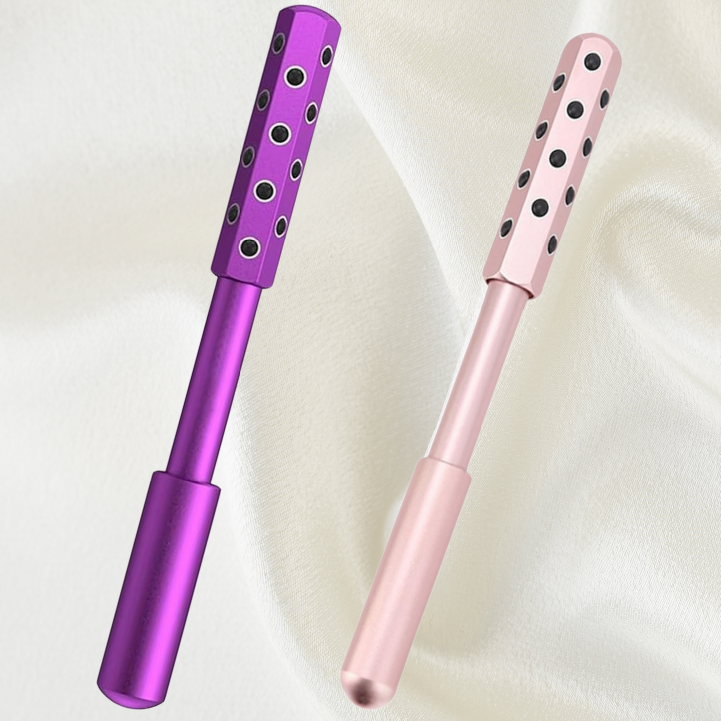 Two germanium face rollers standing upright, in purple and pink, anti-aging beauty tools for facial care
